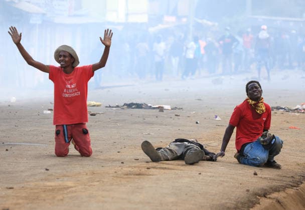 Protest held in Kenya against planned U.S. Ebola quarantine facility NANYUKI, KENYA - JUNE 09: Kenyan police use water cannons and tear gas to disperse demonstrators who blocked a road and set fires during a protest against a planned Ebola quarantine facility for U.S. citizens in Nanyuki, central Kenya on June 09, 2026. A protester collapses to the ground as others raise their hands to stop the police intervention. Lucas Mukasa Anadolu Nanyuki Kenya. Editorial use only. Please get in touch for any other usage.  Copyright: x2026xAnadoluxLucasxMukasax