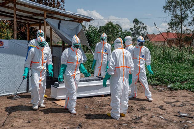 Healthcare workers take measures against Ebola outbreak at hospital in DRC ITURI, DEMOCRATIC REPUBLIC OF THE CONGO - JUNE 08: Health workers, wearing protective gear, retrieve the body of a citizen who died of Ebola virus from the Rwampara Hospital morgue for burial procedures, as teams carry out disinfection work at the hospital, considered the epicenter of the outbreak, in the Ituri province of the Democratic Republic of the Congo on June 08, 2026. Stringer Anadolu Democratic Republic of the Congo Ituri. Editorial use only. Please get in touch for any other usage.  Copyright: x2026xAnadoluxStringerx