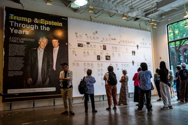 People visit a pop-up exhibit The Donald J. Trump and Jeffrey Epstein Memorial Reading Room featuring a timeline of the relationship between President Donald Trump and convicted sex offender Jeffrey Epstein in Washington, DC on Tuesday, June 9, 2026. The traveling exhibit, run by The Institute of Primary Facts, includes 3,437 bound volumes of documents and photographs released by the Department of Justice on Epstein, who died in 2019.  WAP20260609414 BONNIExCASH