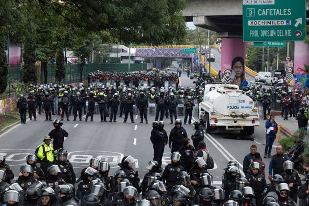 June 9, 2026, Mexico City, Mexico: Members of the National Coordinator of Education Workers (CNTE) marched from TaxqueoÂ±a to Mexico City Stadium as part of the national teachers strike and their encampment in the Mexican capital. During their march to the stadium, they were stopped by a large police presence and the deployment of a crane and barricades. The demonstration was part of a series of actions organized by the union to demand better working conditions and reforms to the pension system, just days before the start of the 2026 FIFA World Cup in Mexico. Mexico City Mexico - ZUMAl178 20260609_znp_l178_012 Copyright: xCristianxLeyvax