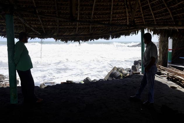Tropical Storm Cristina hit Puerto Madero of Mexico TAPACHULA, MEXICO - JUNE 09: Two men observe the strong waves caused by Tropical Storm Cristina in the coastal community of Puerto Madero, near Tapachula, Mexico, on Tuesday, June 09, 2026. The storm caused severe damage along the Mexican Pacific coast in the state of Chiapas, near the Guatemala border, where strong waves and storm surges impacted dozens of homes and restaurants, affecting hundreds of residents. Jose Torres Anadolu Tapachula Mexico. Editorial use only. Please get in touch for any other usage.  Copyright: x2026xAnadoluxJosexTorresx