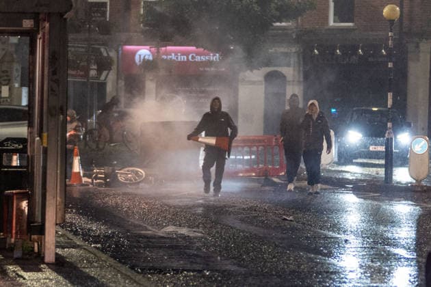 June 9, 2026, Belfast, Antrim, United Kingdom: Youths block a road during the demonstration. Belfast erupted into flames as locals took to the streets to protest against the stabbing of a North Belfast man by a Sudanese national refugee. Road blockades were set up all over Belfast bringing much of the city to a standstill. The protestors are demanding a stop to immigration into Northern Ireland. Belfast United Kingdom - ZUMAs197 20260609_aaa_s197_280 Copyright: xLabxMox