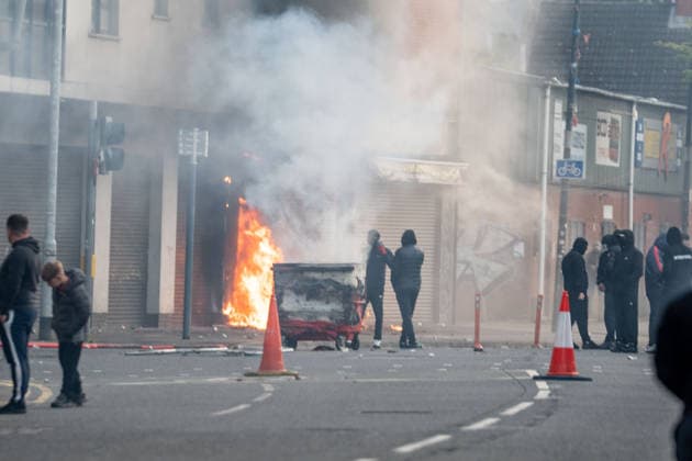 June 9, 2026, Belfast, Antrim, United Kingdom: Belfast youths burn down a grocery store owned by an immigrant. Belfast erupted into flames as locals took to the streets to protest against the stabbing of a North Belfast man by a Sudanese national refugee. Road blockades were set up all over Belfast bringing much of the city to a standstill. The protestors are demanding a stop to immigration into Northern Ireland. Belfast United Kingdom - ZUMAs197 20260609_aaa_s197_286 Copyright: xLabxMox