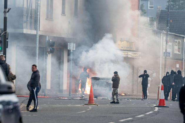 June 9, 2026, Belfast, Antrim, United Kingdom: Belfast youths burn down a grocery store owned by an immigrant during the protest. Belfast erupted into flames as locals took to the streets to protest against the stabbing of a North Belfast man by a Sudanese national refugee. Road blockades were set up all over Belfast bringing much of the city to a standstill. The protestors are demanding a stop to immigration into Northern Ireland. Belfast United Kingdom - ZUMAs197 20260609_aaa_s197_289 Copyright: xLabxMox