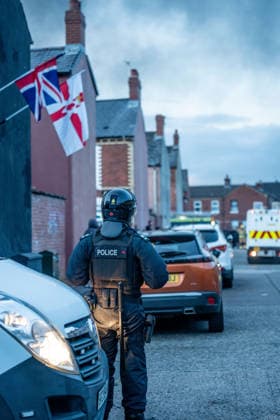 June 9, 2026, Belfast, Antrim, United Kingdom: Riot Police arrive at the scene of a fire lit by protestors in Belfast. Belfast erupted into flames as locals took to the streets to protest against the stabbing of a North Belfast man by a Sudanese national refugee. Road blockades were set up all over Belfast bringing much of the city to a standstill. The protestors are demanding a stop to immigration into Northern Ireland. Belfast United Kingdom - ZUMAs197 20260609_aaa_s197_292 Copyright: xLabxMox