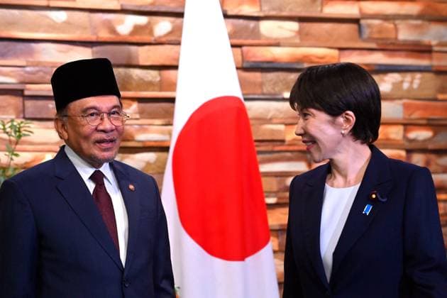 Japan - Malaysia Diplomacy TOKYO, JAPAN - JUNE 10: Japanese Prime Minister Sanae Takaichi (R) and Malaysian Prime Minister Anwar Ibrahim (L) pose for photographs ahead of their bilateral meeting at the Prime Minister’s Office in Tokyo, Japan, on June 10, 2026. Malaysian Prime Minister Anwar Ibrahim is on a three-day official visit to Japan aimed at securing natural gas supplies, accelerating the energy transition and strengthening bilateral defence agreements. David Mareuil Anadolu Tokyo Japan. Editorial use only. Please get in touch for any other usage.  Copyright: x2026xAnadoluxDavidxMareuilx