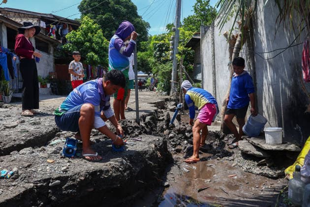 Nearly 88,000 affected by 7.8-magnitude quake, 22,690 remain displaced in Southern Philippines GENERAL SANTOS, PHILIPPINES – JUNE 10: Residents work to repair water supply systems on a cracked road following a deadly earthquake in General Santos, Philippines, on June 10, 2026. Nearly 88,000 people across southern Mindanao have been affected by a magnitude 7.8 earthquake that struck southern Philippines on June 8, while more than 22,000 remain displaced as aftershocks continue, according to government and NGO figures. The quake has killed dozens of people, damaged infrastructure and homes, and caused residential buildings and poorly constructed houses to collapse, making it the strongest earthquake to hit the disaster-prone Southeast Asian c  Copyright: x2026xAnadoluxDanielxCengx