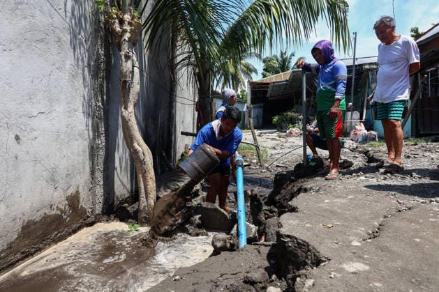 Nearly 88,000 affected by 7.8-magnitude quake, 22,690 remain displaced in Southern Philippines GENERAL SANTOS, PHILIPPINES – JUNE 10: Residents work to repair water supply systems on a cracked road following a deadly earthquake in General Santos, Philippines, on June 10, 2026. Nearly 88,000 people across southern Mindanao have been affected by a magnitude 7.8 earthquake that struck southern Philippines on June 8, while more than 22,000 remain displaced as aftershocks continue, according to government and NGO figures. The quake has killed dozens of people, damaged infrastructure and homes, and caused residential buildings and poorly constructed houses to collapse, making it the strongest earthquake to hit the disaster-prone Southeast Asian c  Copyright: x2026xAnadoluxDanielxCengx