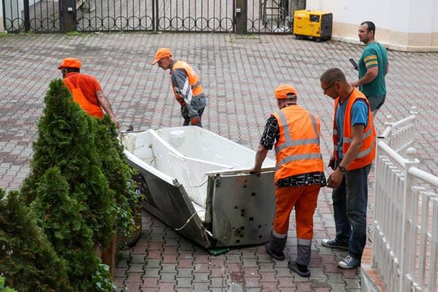 RECORD DATE NOT STATED Utility workers stand beside a refrigerator damaged in a Russian drone attack on Odesa, Ukraine, on June 10, 2026. The Russian army attacked the city with strike drones. Residential buildings were damaged in the attack. Three people were injured, including two children (Photo by Nina Liashonok Ukrinform) Russian drone strike damages housing in Odesa  Copyright: xNinaxLiashonokx