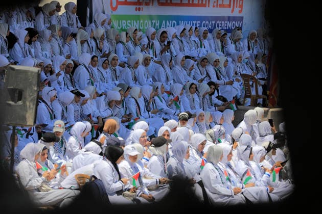 Nursing students hold white coat ceremony amid Gaza ruins Palestinian students from the Faculty of Nursing and Health Sciences at the University College of Applied Sciences take part in a White Coat Ceremony and Nursing Oath event amid the ruins of the college s buildings in Gaza City on June 10, 2026. The ceremony, attended by representatives of international and donor organizations, was held at the site of facilities destroyed during the war and marks the beginning of the students’ practical training in the health sector. Photo by Bilal Osama apaimages Gaza city Gaza Strip Palestinian Territory 100626_Gaza_BO_00(44) Copyright: xapaimagesxBilalxOsamax xapaimagesx