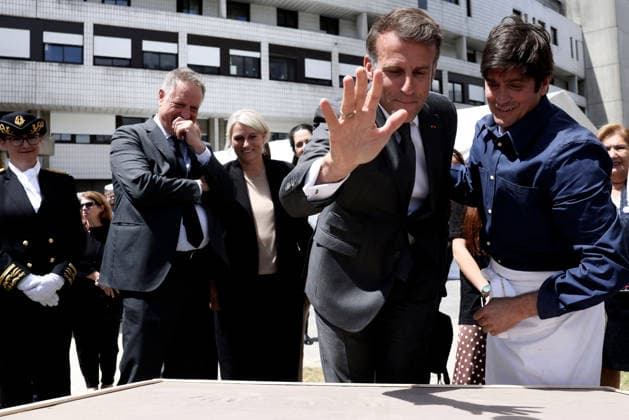 Emmanuel Macron and Brigitte Macron Visit the Robert-Debre Hospital - Paris French President Emmanuel Macron attends a handprint event during the foundation stone laying ceremony for the Child Brain Institute (ICE - Institut Robert-Debre du Cerveau de l’Enfant) at the Robert-Debre Hospital in Paris on June 10, 2026. Photo by Stephane Lemouton Pool ABACAPRESS.COM Paris France  Copyright: xLemoutonxStephane Pool ABACAx