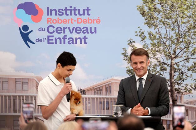 Emmanuel Macron and Brigitte Macron Visit the Robert-Debre Hospital - Paris French President Emmanuel Macron delivers a speech next to Adrien Taquet, Chairman of the Supervisory Board of the Robert-Debre Institute for the Child s Brain and Professor Ghislaine Dehaene during the foundation stone laying ceremony for the Child Brain Institute (ICE - Institut Robert-Debre du Cerveau de l’Enfant) at the Robert-Debre Hospital in Paris, on June 10, 2026. Photo by Stephane Lemouton Pool ABACAPRESS.COM Paris France  Copyright: xLemoutonxStephane Pool ABACAx