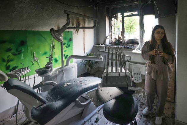 A woman stands in a dental office in an apartment block, damaged by a Russian drone attack on a district of Kharkiv, Ukraine, June 10, 2026. Russian forces struck the northeastern city with drones, injuring at least eight people. One of the drones hit an apartment block, housing a dental office. (Photo by Viacheslav Madiievskyi Ukrinform) Russians damage dental office in Kharkiv  Copyright: xViacheslavxMadiievskyix