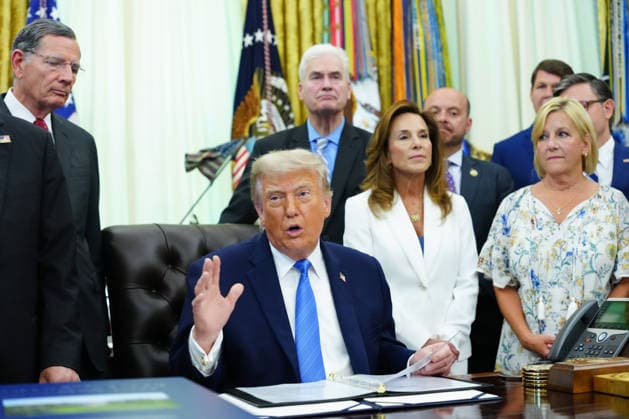 US President Donald Trump, center, during a signing ceremony for the Secure America Act in the Oval Office of the White House in Washington, DC on Wednesday, June 10, 2026. The SAVE America Act requires proof of citizenship to register to vote.  WAX20260610808 AaronxSchwartz