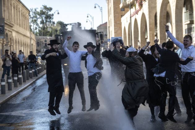 Police intervene as Ultra-Orthodox Jews block roads in West Jerusalem WEST JERUSALEM - JUNE 10: Israeli police use stun grenades and water cannons to disperse Ultra-Orthodox (Haredi) Jews blocking roads during a protest on June 10, 2026. Three demonstrators were detained during the incidents in West Jerusalem, where crowds gathered to protest against compulsory military service. Mostafa Alkharouf Anadolu Jerusalem Israel. Editorial use only. Please get in touch for any other usage.  Copyright: x2026xAnadoluxMostafaxAlkharoufx