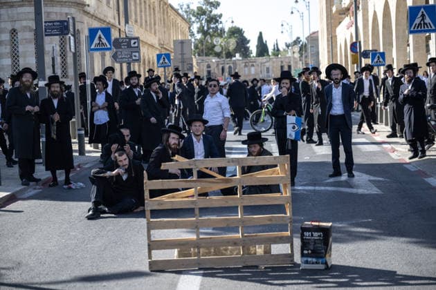 Police intervene as Ultra-Orthodox Jews block roads in West Jerusalem WEST JERUSALEM - JUNE 10: Ultra-Orthodox (Haredi) Jews block roads during a protest on June 10, 2026. Three demonstrators were detained during the incidents in West Jerusalem, where crowds gathered to protest against compulsory military service. Mostafa Alkharouf Anadolu Jerusalem Israel. Editorial use only. Please get in touch for any other usage.  Copyright: x2026xAnadoluxMostafaxAlkharoufx