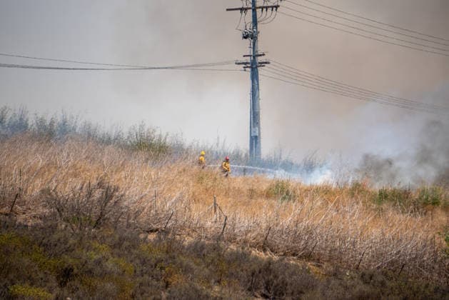 June 10, 2026, Oceanside, California, USA: Fire crews battle the November Fire off Foussat Rd. in Oceanside, California, on June 10, 2026. Multiple resources were called to subdue the nearly 850 acre fire that borders Camp Pendleton and the Whelan Lake Audubon Society Preserve. Oceanside USA - ZUMAg219 20260610_znp_g219_003 Copyright: xJakexLeexGreenx