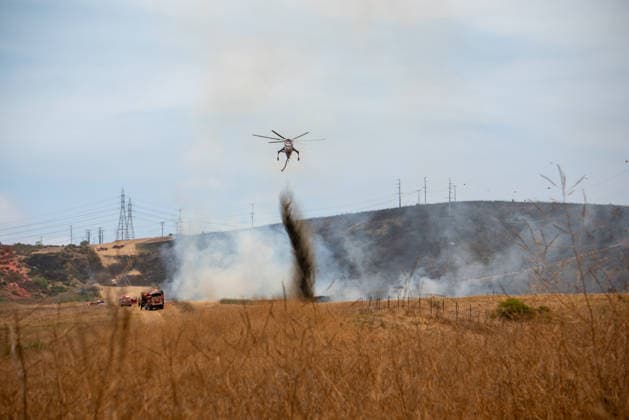 June 10, 2026, Oceanside, California, USA: Fire crews battle the November Fire off Foussat Rd. in Oceanside, California, on June 10, 2026. Multiple resources were called to subdue the nearly 850 acre fire that borders Camp Pendleton and the Whelan Lake Audubon Society Preserve. Oceanside USA - ZUMAg219 20260610_znp_g219_002 Copyright: xJakexLeexGreenx