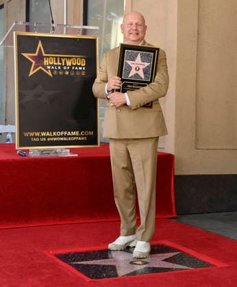 Chris Meledandri, CEO, Illumination holds a replica plaque during an unveiling ceremony honoring him with the 2,848th star on the Hollywood Walk of Fame in Los Angeles on Wednesday, June 10, 2026.  LAP2026061011 JIMxRUYMEN