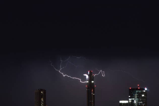 June 10, 2026, Frankfurt, Hesse, Germany: Lightning strikes behind part of the financial district skyline during a thunderstorm in Frankfurt am Main, Germany. Frankfurt Germany - ZUMAb332 20260610_zip_b332_014 Copyright: xMatiasxBasualdox