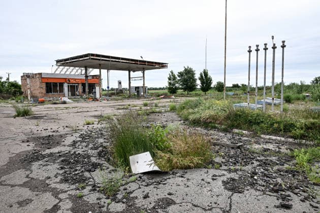 RECORD DATE NOT STATED A gas station destroyed during hostilities is seen along the Mykolaiv–Kherson highway, Ukraine, on June 3, 2026. The Russian army attacks Kherson and the surrounding region daily with FPV drones and other unmanned aerial vehicles, deliberately terrorizing civilians. Russian forces conduct hunts for local residents, tracking them with FPV drones and dropping explosives. Police officers, medics, public transport, and civilian infrastructure are also targeted. Based on the intensity of attacks, Kherson is informally divided into yellow and red zones, with the red zone considered the most dangerous due to constant shelling and drone strikes (Photo by Dmytro Smolienko Ukrinform) Life under shelling in frontline Kherson  Copyright: xDmytroxSmolienkox