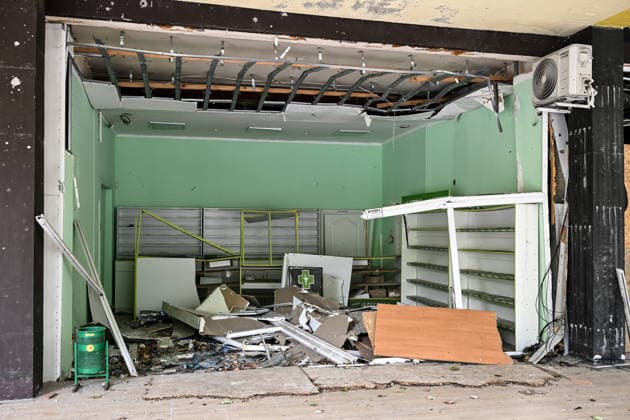 RECORD DATE NOT STATED A pharmacy destroyed by Russian attacks is seen in the red zone of the frontline city of Kherson, the area considered the most dangerous due to constant Russian attacks, Kherson, Ukraine, on June 3, 2026. The Russian army attacks the city daily with FPV drones and other unmanned aerial vehicles, deliberately terrorizing civilians. Russian forces conduct hunts for local residents, tracking them with FPV drones and dropping explosives. Police officers, medics, public transport, and urban infrastructure are also targeted. Based on the intensity of attacks, Kherson is informally divided into yellow and red zones, with the red zone subjected to continuous shelling and drone strikes. Anti-drone netting has been installed above roads to  Copyright: xDmytroxSmolienkox