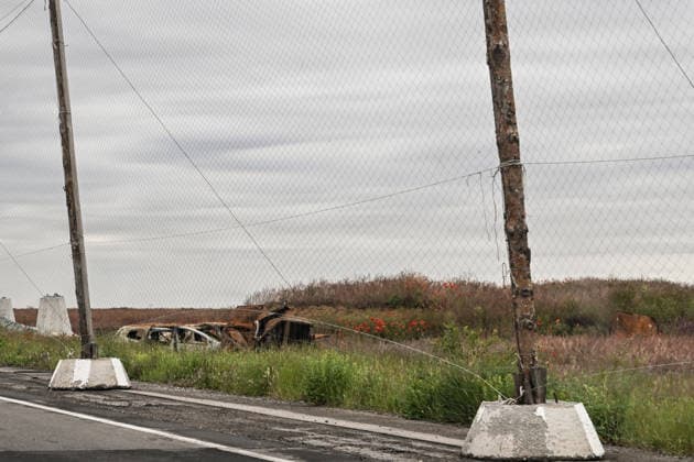 RECORD DATE NOT STATED Destroyed vehicles stand along the Mykolaiv–Kherson highway in Kherson region, Ukraine, on June 3, 2026. The Russian army attacks the city daily with FPV drones and other unmanned aerial vehicles, deliberately terrorizing civilians. Russian forces conduct hunts for local residents, tracking them with FPV drones and dropping explosives. Police officers, medics, public transport, and urban infrastructure are also targeted (Photo by Dmytro Smolienko Ukrinform) Life under shelling in frontline Kherson  Copyright: xDmytroxSmolienkox