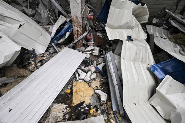RECORD DATE NOT STATED Figure skating and hockey skates lie among rubble and construction debris at the ruins of the Favoryt Arena ice sports palace, destroyed in Russian guided aerial bomb (KAB) strikes, in the frontline city of Kherson, Ukraine, on June 3, 2026. The Russian army attacks the city daily with FPV drones and other unmanned aerial vehicles, deliberately terrorizing civilians. Russian forces conduct hunts for local residents, tracking them with FPV drones and _drop_ping explosives. Police officers, medics, public transport, and urban infrastructure are also targeted (Photo by Dmytro Smolienko Ukrinform) Life under shelling in frontline Kherson  Copyright: xDmytroxSmolienkox