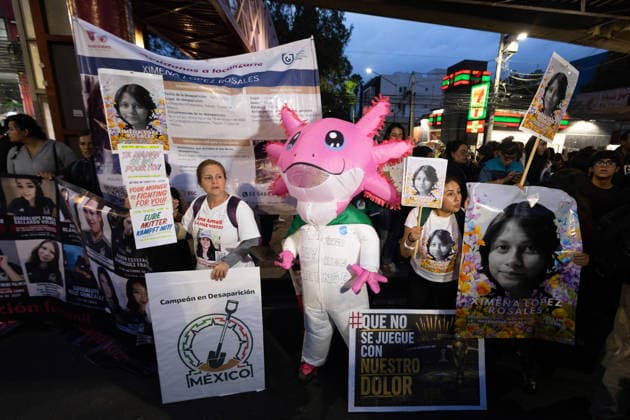 June 10, 2026, Mexico City, Mexico: Relatives of missing persons and search collectives took part in the Light Up the Search march from the rail station to the Banorte Stadium in Mexico City. The mobilization was part of a series of protests and actions organized in the context of the opening of the 2026 FIFA World Cup to draw attention to Mexico s disappearance crisis and demand truth, justice and effective search mechanisms. Mexico City Mexico - ZUMAl178 20260610_znp_l178_012 Copyright: xCristianxLeyvax