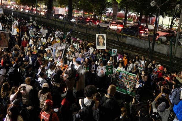 June 10, 2026, Mexico City, Mexico: Relatives of missing persons and search collectives took part in the Light Up the Search march from the rail station to the Banorte Stadium in Mexico City. The mobilization was part of a series of protests and actions organized in the context of the opening of the 2026 FIFA World Cup to draw attention to Mexico s disappearance crisis and demand truth, justice and effective search mechanisms. Mexico City Mexico - ZUMAl178 20260610_znp_l178_051 Copyright: xCristianxLeyvax