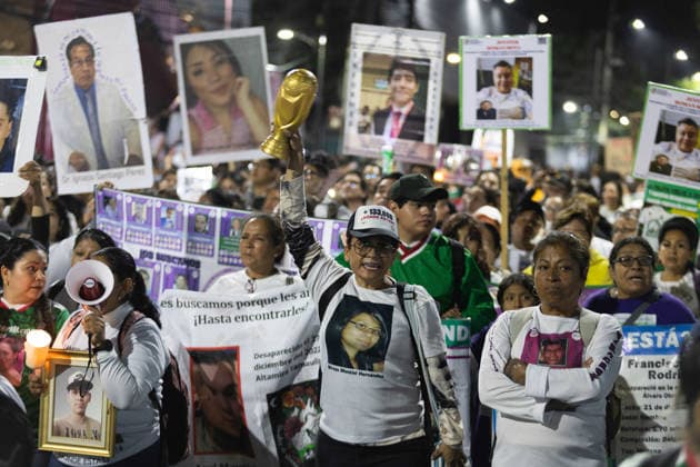 June 10, 2026, Mexico City, Mexico: Relatives of missing persons and search collectives took part in the Light Up the Search march from the rail station to the Banorte Stadium in Mexico City. The mobilization was part of a series of protests and actions organized in the context of the opening of the 2026 FIFA World Cup to draw attention to Mexico s disappearance crisis and demand truth, justice and effective search mechanisms. Mexico City Mexico - ZUMAl178 20260610_znp_l178_039 Copyright: xCristianxLeyvax