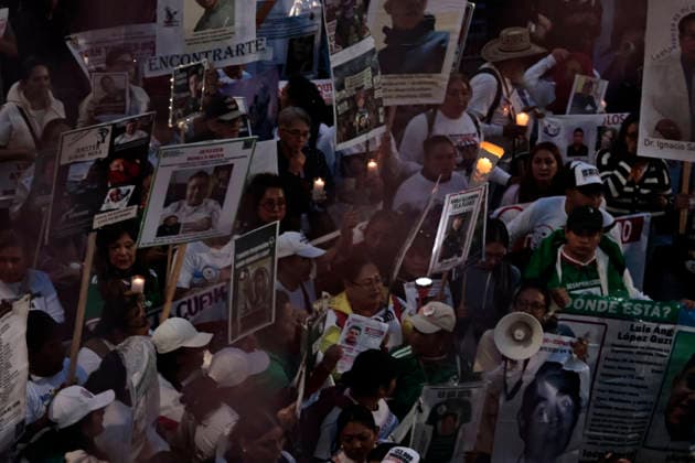 June 10, 2026, Mexico City, Cdmx, Mexico: Hours before the opening of the 2026 FIFA World Cup at Mexico City Stadium, hundreds of mothers, search collectives, and relatives of disappeared persons marched to try to reach the stadium. This proved impossible, as the government of Clara Brugada has spent several days erecting metal barriers and deploying hundreds of police officers a mile away from the stadium. Families of victims of enforced disappearance chanted slogans demanding that Mayor Claudia Sheinbaum acknowledge that there is a budget to host a large-scale sporting event, but no resources to search for the more than 133,000 disappeared persons. They argued that these families are doing the work of the Attorney General s Offices becaus - ZUMAp204 20260610_zip_p204_066 Copyright: xJosuexPerezx