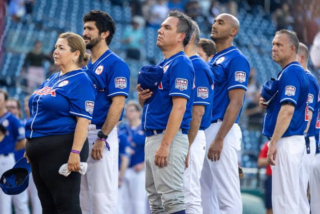 Congressional Baseball Game in Washington, DC WASHINGTON, DC, UNITED STATES - JUNE 10: Members of the Democratic team take their hats off for the national anthem ahead of the Congressional Baseball Game at Nationals Park in Washington, DC, United States, on June 10, 2026. Nathan Posner Anadolu Washington, DC United States. Editorial use only. Please get in touch for any other usage.  Copyright: x2026xAnadoluxNathanxPosnerx