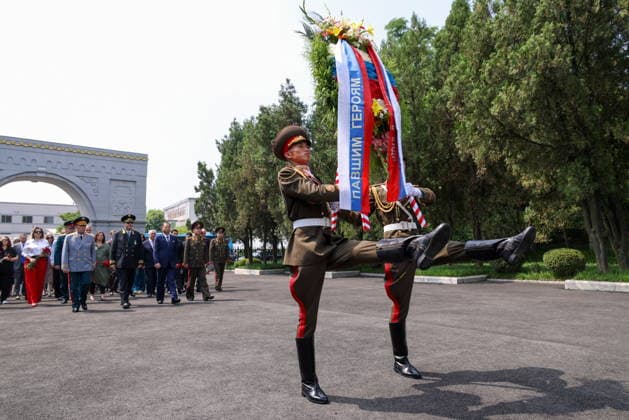 NORTH KOREA, PYONGYANG - JUNE 11, 2026: Staff members of Russian institutions attend a wreath laying ceremony at the Liberation Monument marking the upcoming Russia Day. Stanislav Varivoda TASS  93653342