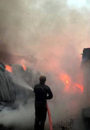GHAZIABAD, INDIA - JUNE 10: Fire brigade personnel extinguish a fire that reportedly broke out due to a short circuit at the S.S. Furniture Sofa Home factory in the Sahibabad Industrial Area , on June 10, 2026 in Ghaziabad, India. The blaze gutted furniture stored in the factory and destroyed a car and a motorcycle. (Photo by Sakib Ali Hindustan Times ) Massive Fire Engulfed Furniture Factory In Ghaziabad’s Sahibabad Village