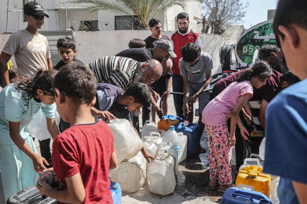 Displaced Palestinians queue for water in central Gaza Displaced Palestinians gather to collect drinking water and water for daily use from a mobile distribution truck in the Bureij refugee camp in the central Gaza Strip on June 11, 2026. Palestinians in Gaza face a severe shortage of drinking and household water as wells and water facilities remain disrupted due to shortages of fuel and spare parts, forcing residents to wait for hours and travel long distances to obtain limited supplies amid rising temperatures and increased demand during the summer season. Photo by Moiz Salhi apaimages Nusairat Gaza Strip Palestinian Territory 110626_Bureij_MS_00(1) Copyright: xapaimagesxMoizxSalhixx xapaimagesx