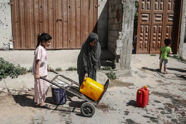 Displaced Palestinians queue for water in central Gaza Displaced Palestinians gather to collect drinking water and water for daily use from a mobile distribution truck in the Bureij refugee camp in the central Gaza Strip on June 11, 2026. Palestinians in Gaza face a severe shortage of drinking and household water as wells and water facilities remain disrupted due to shortages of fuel and spare parts, forcing residents to wait for hours and travel long distances to obtain limited supplies amid rising temperatures and increased demand during the summer season. Photo by Moiz Salhi apaimages Nusairat Gaza Strip Palestinian Territory 110626_Bureij_MS_00(13) Copyright: xapaimagesxMoizxSalhixx xapaimagesx