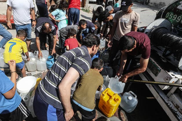 Displaced Palestinians queue for water in central Gaza Displaced Palestinians gather to collect drinking water and water for daily use from a mobile distribution truck in the Bureij refugee camp in the central Gaza Strip on June 11, 2026. Palestinians in Gaza face a severe shortage of drinking and household water as wells and water facilities remain disrupted due to shortages of fuel and spare parts, forcing residents to wait for hours and travel long distances to obtain limited supplies amid rising temperatures and increased demand during the summer season. Photo by Moiz Salhi apaimages Nusairat Gaza Strip Palestinian Territory 110626_Bureij_MS_00(6) Copyright: xapaimagesxMoizxSalhixx xapaimagesx