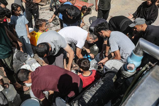 Displaced Palestinians queue for water in central Gaza Displaced Palestinians gather to collect drinking water and water for daily use from a mobile distribution truck in the Bureij refugee camp in the central Gaza Strip on June 11, 2026. Palestinians in Gaza face a severe shortage of drinking and household water as wells and water facilities remain disrupted due to shortages of fuel and spare parts, forcing residents to wait for hours and travel long distances to obtain limited supplies amid rising temperatures and increased demand during the summer season. Photo by Moiz Salhi apaimages Nusairat Gaza Strip Palestinian Territory 110626_Bureij_MS_00(9) Copyright: xapaimagesxMoizxSalhixx xapaimagesx