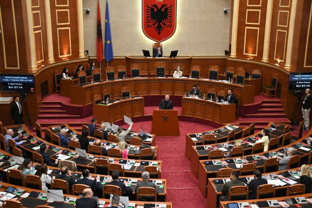 Albanian lawmakers discuss disputed tourism project in Vlora TIRANA, ALBANIA - JUNE 11: Albanian lawmakers attend a parliamentary session in Tirana, Albania, on June 11, 2026. The Albanian Parliament convened to discuss a controversial tourism project planned for the Zvernec area of the coastal city of Vlora. Environment Minister Sofjan Jaupaj answered questions submitted by opposition Democratic Party (PD) lawmakers regarding the project, which has sparked demonstrations across the country. Olsi Shehu Anadolu Tirana Albania. Editorial use only. Please get in touch for any other usage.  Copyright: x2026xAnadoluxOlsixShehux