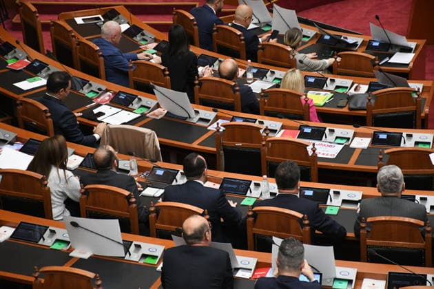 Albanian lawmakers discuss disputed tourism project in Vlora TIRANA, ALBANIA - JUNE 11: Albanian lawmakers attend a parliamentary session in Tirana, Albania, on June 11, 2026. The Albanian Parliament convened to discuss a controversial tourism project planned for the Zvernec area of the coastal city of Vlora. Environment Minister Sofjan Jaupaj answered questions submitted by opposition Democratic Party (PD) lawmakers regarding the project, which has sparked demonstrations across the country. Olsi Shehu Anadolu Tirana Albania. Editorial use only. Please get in touch for any other usage.  Copyright: x2026xAnadoluxOlsixShehux