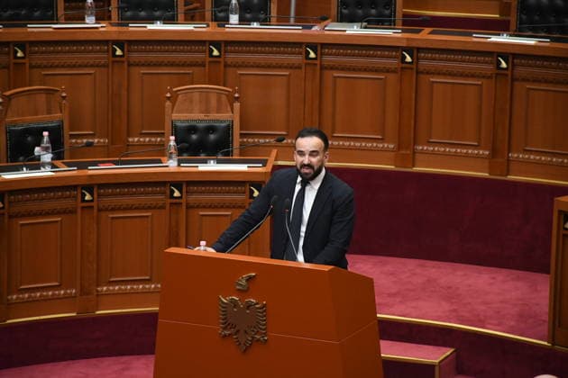 Albanian lawmakers discuss disputed tourism project in Vlora TIRANA, ALBANIA - JUNE 11: Albanian Environment Minister Sofjan Jaupaj speaks during a parliamentary session in Tirana, Albania, on June 11, 2026. The Albanian Parliament convened to discuss a controversial tourism project planned for the Zvernec area of the coastal city of Vlora. Jaupaj answered questions submitted by opposition Democratic Party (PD) lawmakers regarding the project, which has sparked demonstrations across the country. During the session, opposition lawmakers displayed banners in support of recent public protests and called for the resignation of Prime Minister Edi Rama. Olsi Shehu Anadolu Tirana Albania. Editorial use only. Please get in touch for any other usa  Copyright: x2026xAnadoluxOlsixShehux