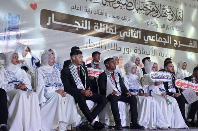 Mass wedding brings hope to displaced couples in Gaza Palestinian brides and grooms take part in the collective wedding ceremony Window of Hope in Khan Younis, southern Gaza Strip, on June 11, 2026. The event brought together dozens of displaced couples from the town of Khuza a, east of Khan Younis, as part of an initiative aimed at supporting newlyweds, easing social and economic burdens, and highlighting the community’s efforts to preserve moments of joy despite ongoing hardship. Photo by Tariq Mohammad APA Images Khan Yunis Gaza Strip Palestinian Territory 110626_Khan_Yunis_TM_01(17) Copyright: xapaimagesxTariqxMohammad xapaimagesx