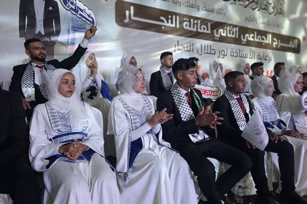 Mass wedding brings hope to displaced couples in Gaza Palestinian brides and grooms take part in the collective wedding ceremony Window of Hope in Khan Younis, southern Gaza Strip, on June 11, 2026. The event brought together dozens of displaced couples from the town of Khuza a, east of Khan Younis, as part of an initiative aimed at supporting newlyweds, easing social and economic burdens, and highlighting the community’s efforts to preserve moments of joy despite ongoing hardship. Photo by Tariq Mohammad APA Images Khan Yunis Gaza Strip Palestinian Territory 110626_Khan_Yunis_TM_01(18) Copyright: xapaimagesxTariqxMohammad xapaimagesx