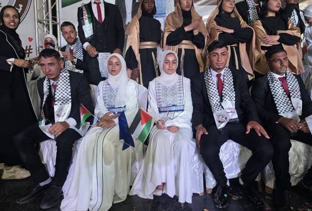 Mass wedding brings hope to displaced couples in Gaza Palestinian brides and grooms take part in the collective wedding ceremony Window of Hope in Khan Younis, southern Gaza Strip, on June 11, 2026. The event brought together dozens of displaced couples from the town of Khuza a, east of Khan Younis, as part of an initiative aimed at supporting newlyweds, easing social and economic burdens, and highlighting the community’s efforts to preserve moments of joy despite ongoing hardship. Photo by Tariq Mohammad APA Images Khan Yunis Gaza Strip Palestinian Territory 110626_Khan_Yunis_TM_01(7) Copyright: xapaimagesxTariqxMohammad xapaimagesx