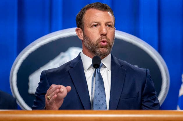 Secretary of the Department of Homeland Security Markwayne Mullin speaks during a press conference at the Department of Justice in Washington, DC on Thursday, June 11, 2026. The leaders announced the government s effort to locate and safeguard unaccompanied alien children (UAC), or children under age 18 who lack both lawful immigration status in the United States, and a parent or legal guardian in the United States.  WAP202606111149a DANIELxHEUER