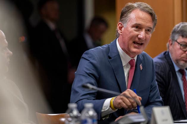 Former Governor Glenn Youngkin, R-VA, speaks during a roundtable on education at the Department of Justice in Washington, DC on Thursday, June 11, 2026.  WAP202606111181 DANIELxHEUER