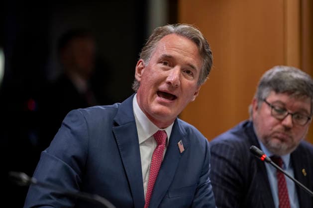 Former Governor Glenn Youngkin, R-VA, speaks during a roundtable on education at the Department of Justice in Washington, DC on Thursday, June 11, 2026.  WAP202606111183 DANIELxHEUER