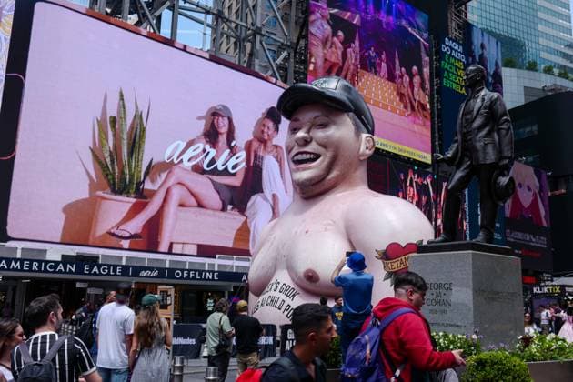 New York, NY- June 11th: A Giant Inflatable Sculpture of Elon Musk in Times Square Manhattan on June 11, displays the statement Ã¢â‚¬oeSpace XÃ¢â‚¬â ¢s Grok Makes AI Child PornÃ¢â‚¬Â.on June 11, 2026 Credit: Camara Porter USA  - ZUMAa123 20260611_zaa_a123_014 Copyright: xAdMediax