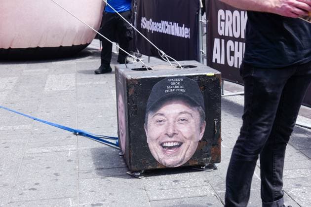 New York, NY- June 11th: A Giant Inflatable Sculpture of Elon Musk in Times Square Manhattan on June 11, displays the statement Ã¢â‚¬oeSpace XÃ¢â‚¬â ¢s Grok Makes AI Child PornÃ¢â‚¬Â.on June 11, 2026 Credit: Camara Porter USA - ZUMAa123 20260611_zaa_a123_007 Copyright: xAdMediax